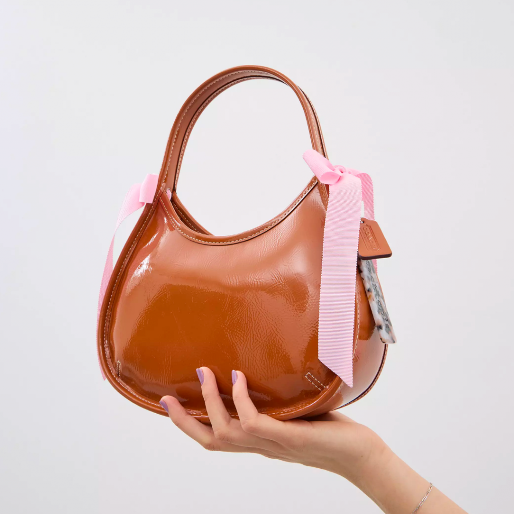 Ergo Bag In Crinkle Patent Coachtopia Leather With Pink Bows in Burnished Amber